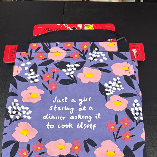 Blue Q just a girl staring at a dinner apron